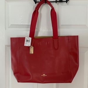 Coach woman’s purse red leather NWT never used